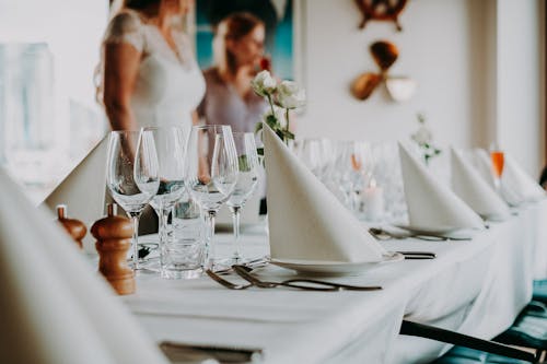 Festive table with wineglasses and plates