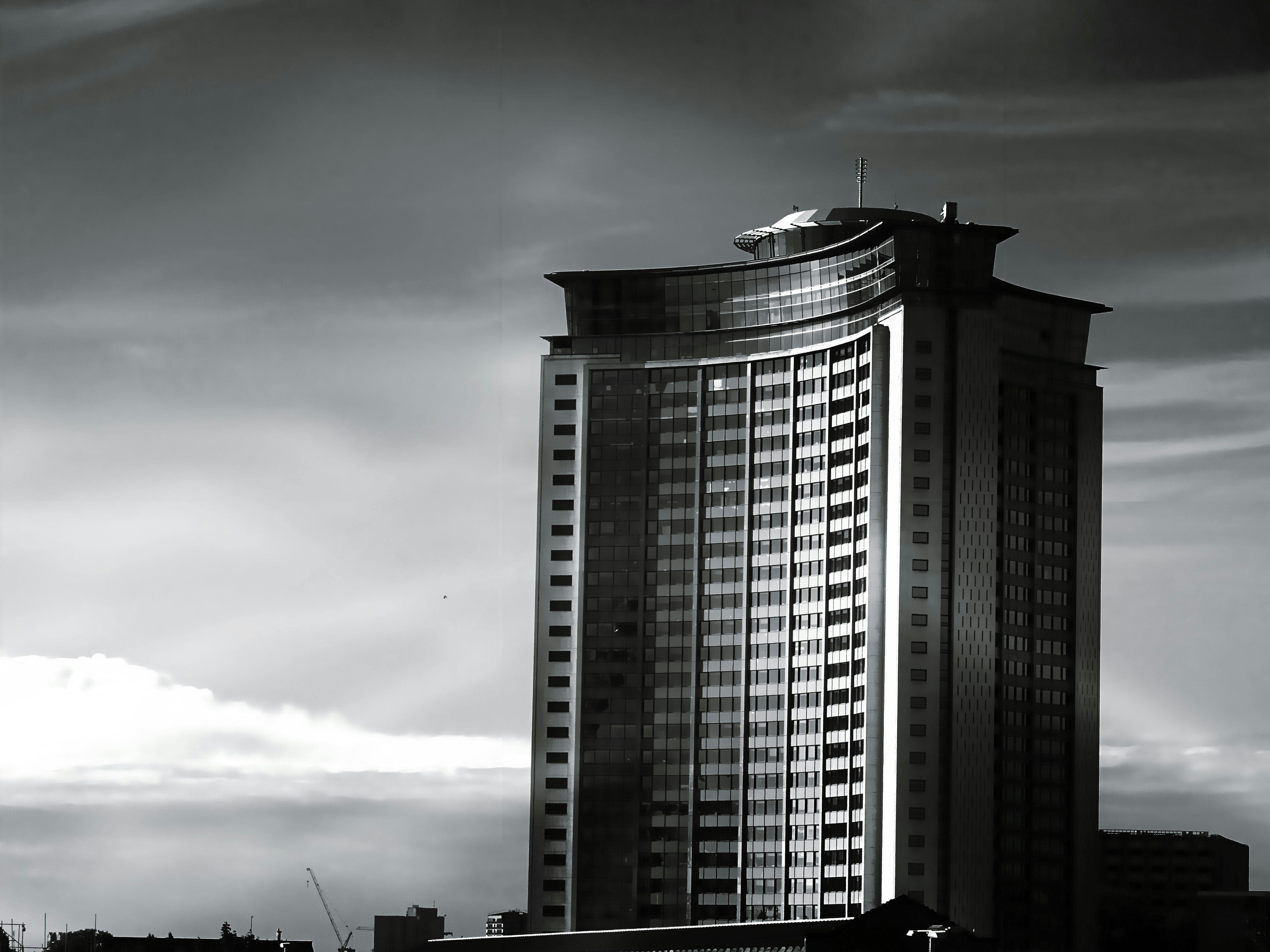 grayscale-of-high-rise-building-free-stock-photo