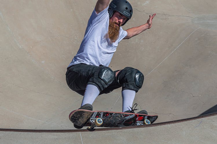 Adult Man Balancing While Skateboarding