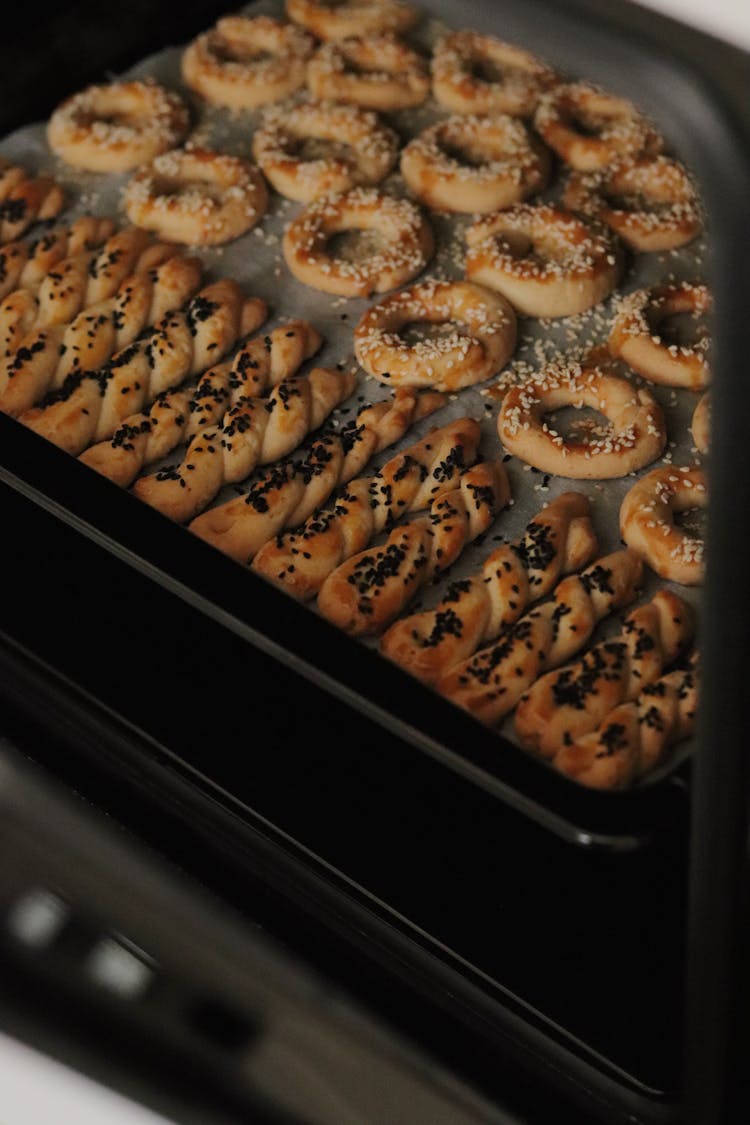 Tasty Crispy Pastries On Tray In Oven