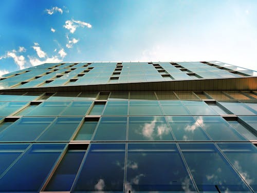 Low-angle Photography of Mirror Glass Curtain Building