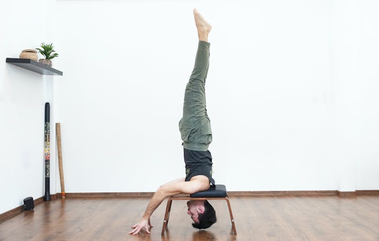 Man Doing A Headstand 