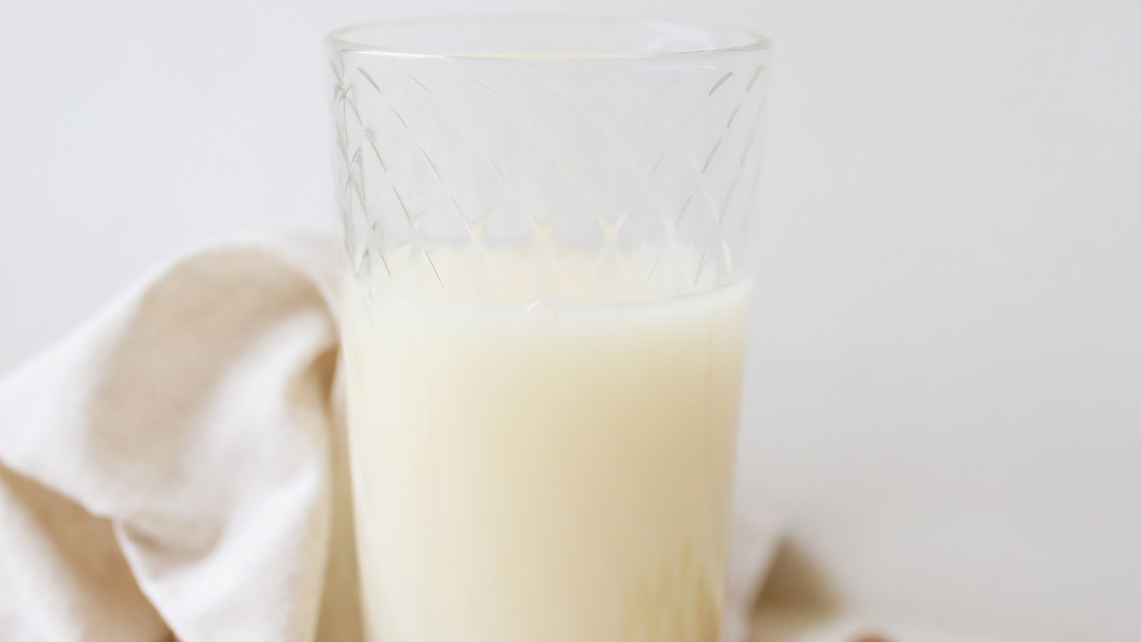 A glass of almond milk surrounded by almonds — photo by Polina Tankilevitch on Pexels A glass of almond milk surrounded by almonds