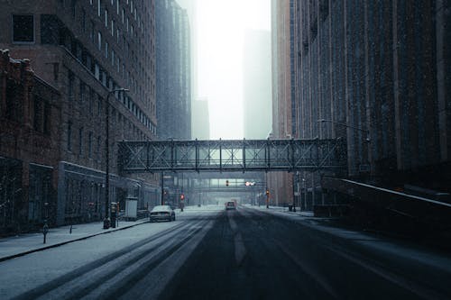 Free Empty Road Between High Rise Buildings Stock Photo