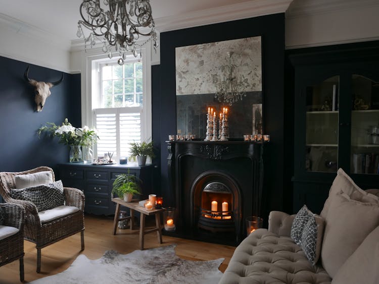 Interior Of Elegant Living Room With Fireplace And Vintage Furniture