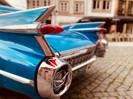 Detailed shot of classic blue vintage car taillights and fins in Braga, Portugal.