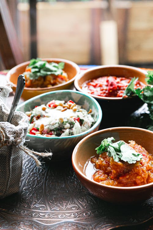 Traditional tasty dishes served on copper tray for lunch in Mediterranean cafe