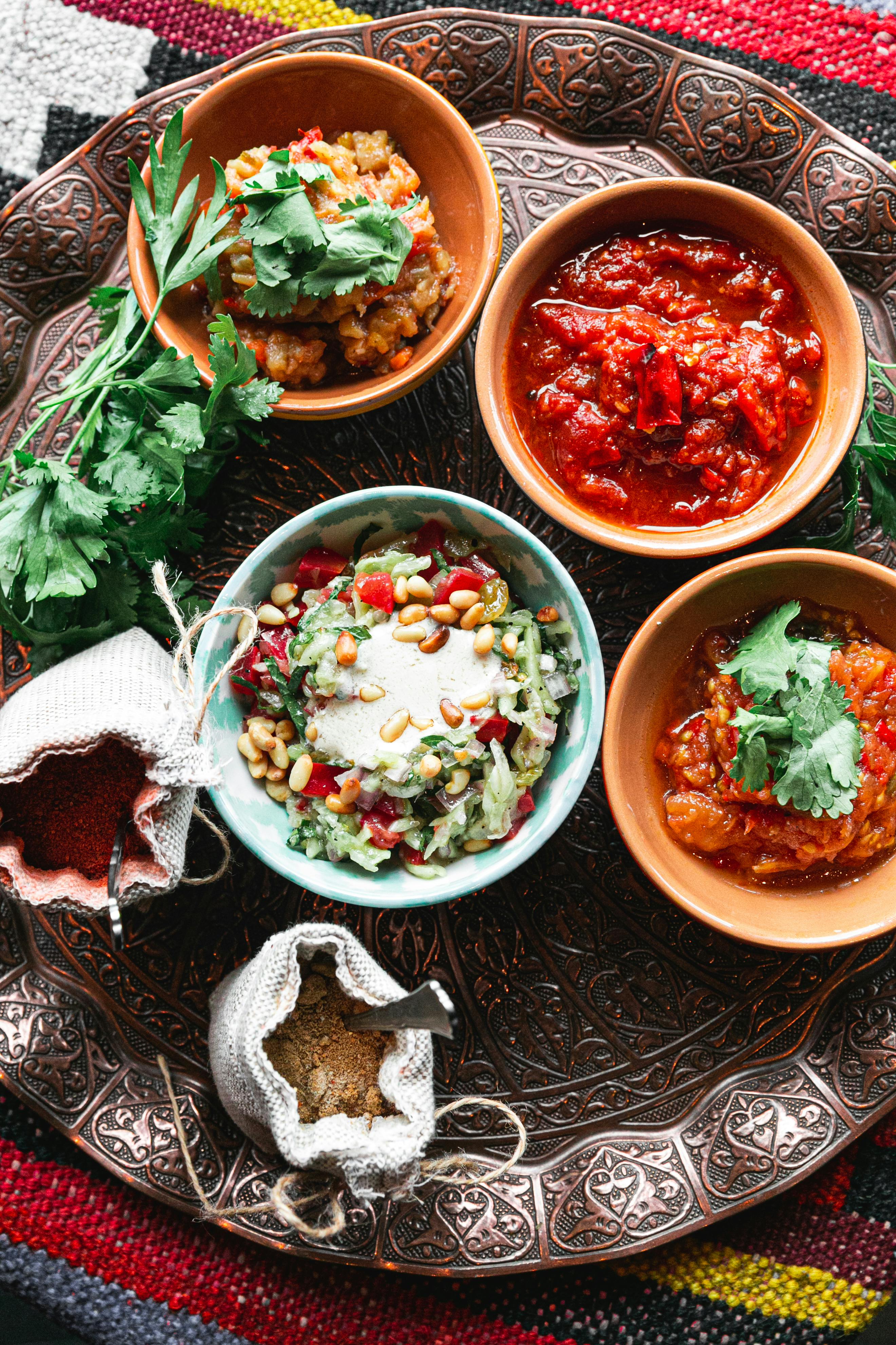 Person holding their hand under warm running water from a tap