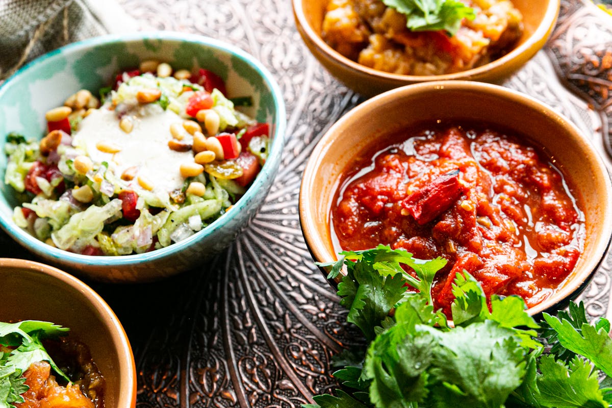 Person relaxing on a sofa with a cup of tea, emphasizing recovery and wellness