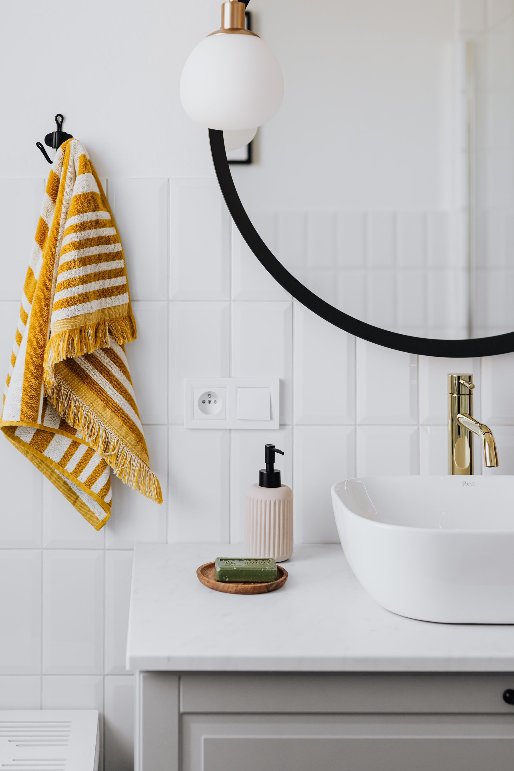 Soft folded textiles introducing a warm seasonal color accent