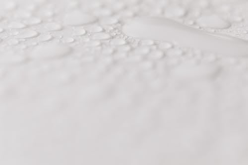 Clean white background with water drops