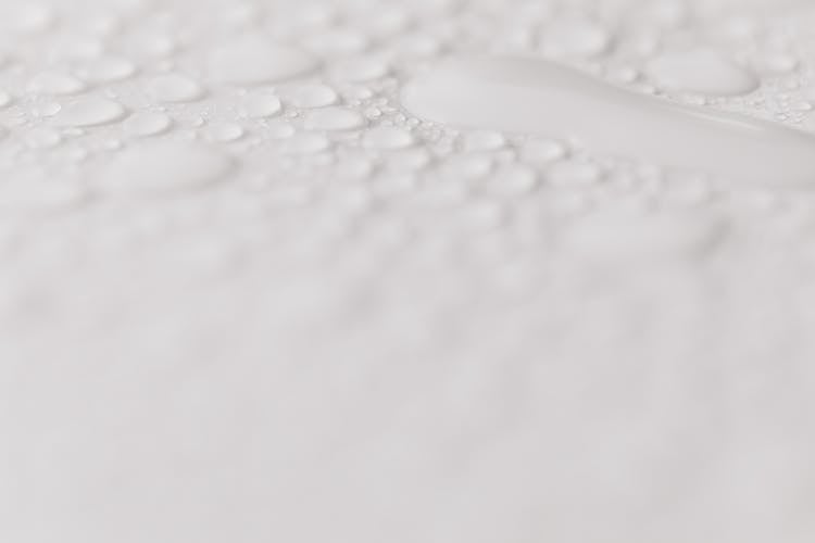 Clean White Background With Water Drops
