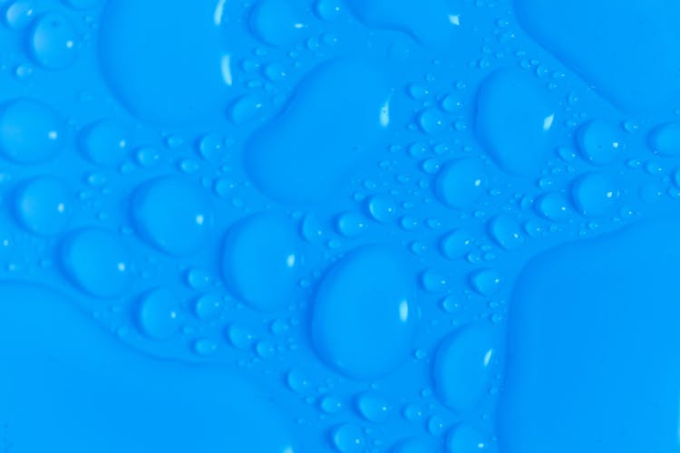 Dark Blue Background With Liquid Drops