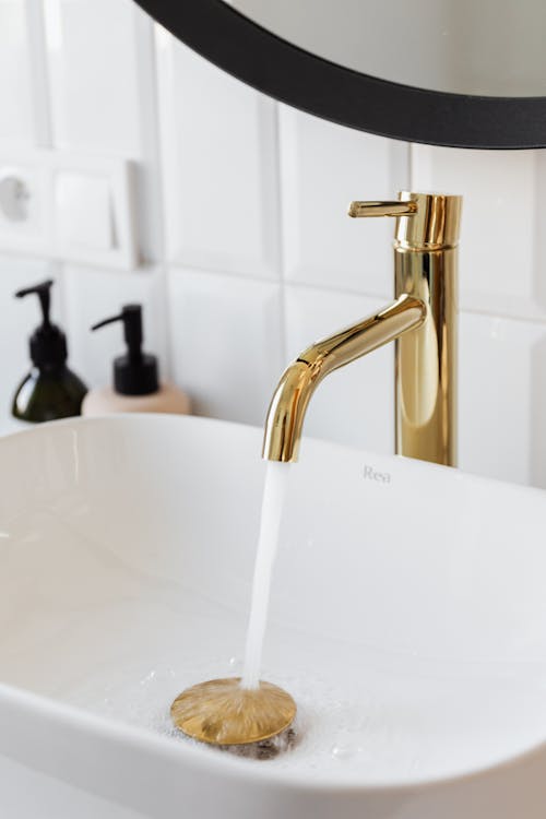 Free Gold Faucet in Close Up Photography Stock Photo