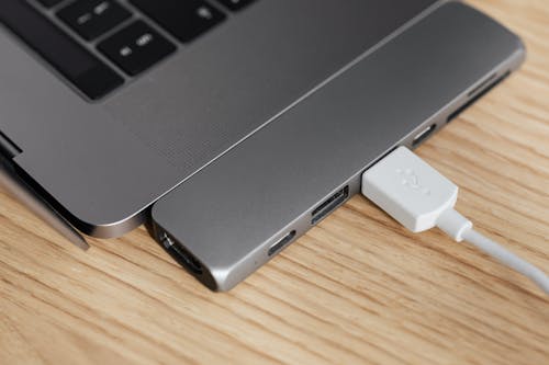 Free Gray laptop with connected USB multiport station Stock Photo