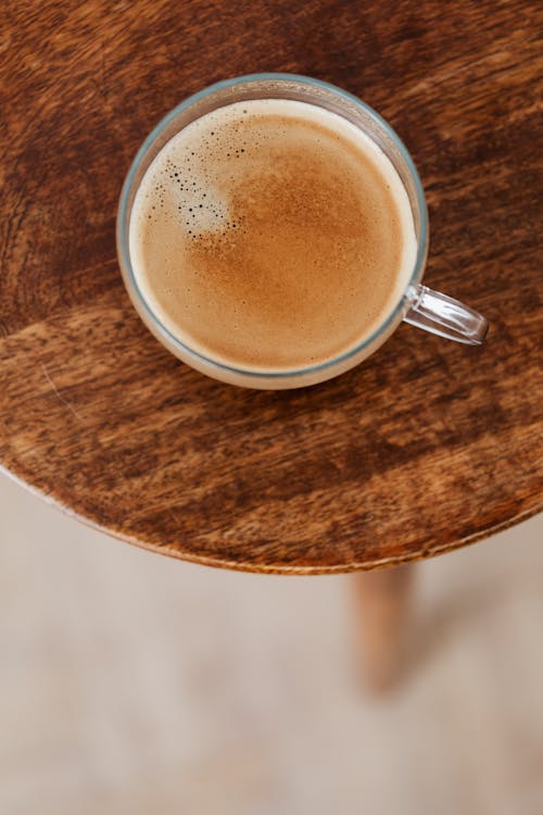 Cup of coffee on wooden table