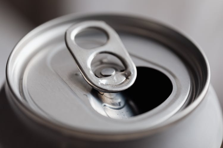 Open Grey Metal Soda Can