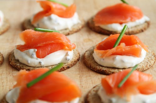 Brown White and Orange Round Food on Table Top