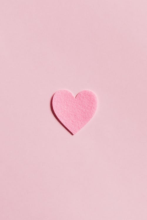 Free Paper Heart on Light Pink Background Stock Photo