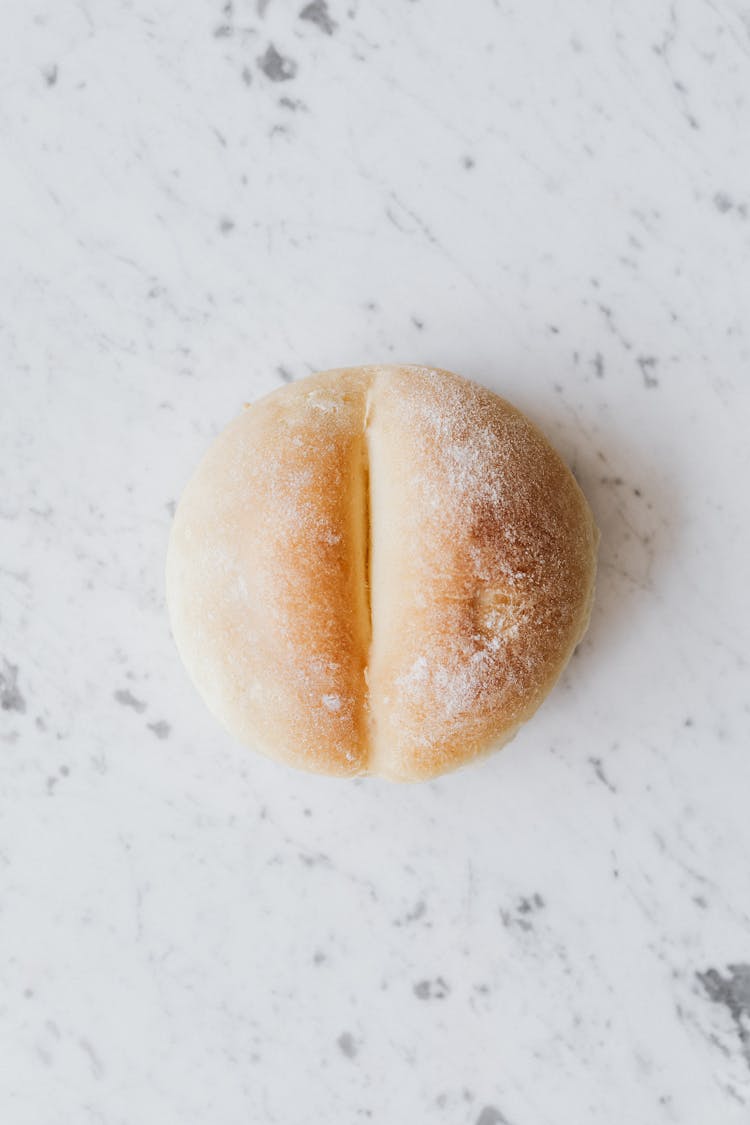 White Fresh Bread On Table In Kitchen