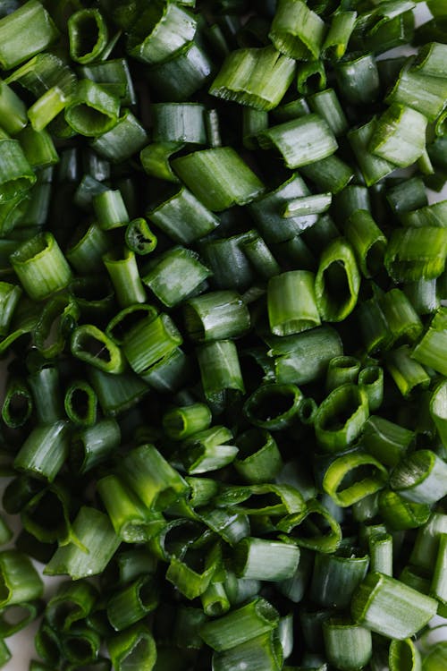 Free Green onion chopped for meal in kitchen Stock Photo