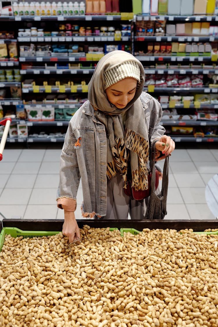 Woman Picking Peanuts