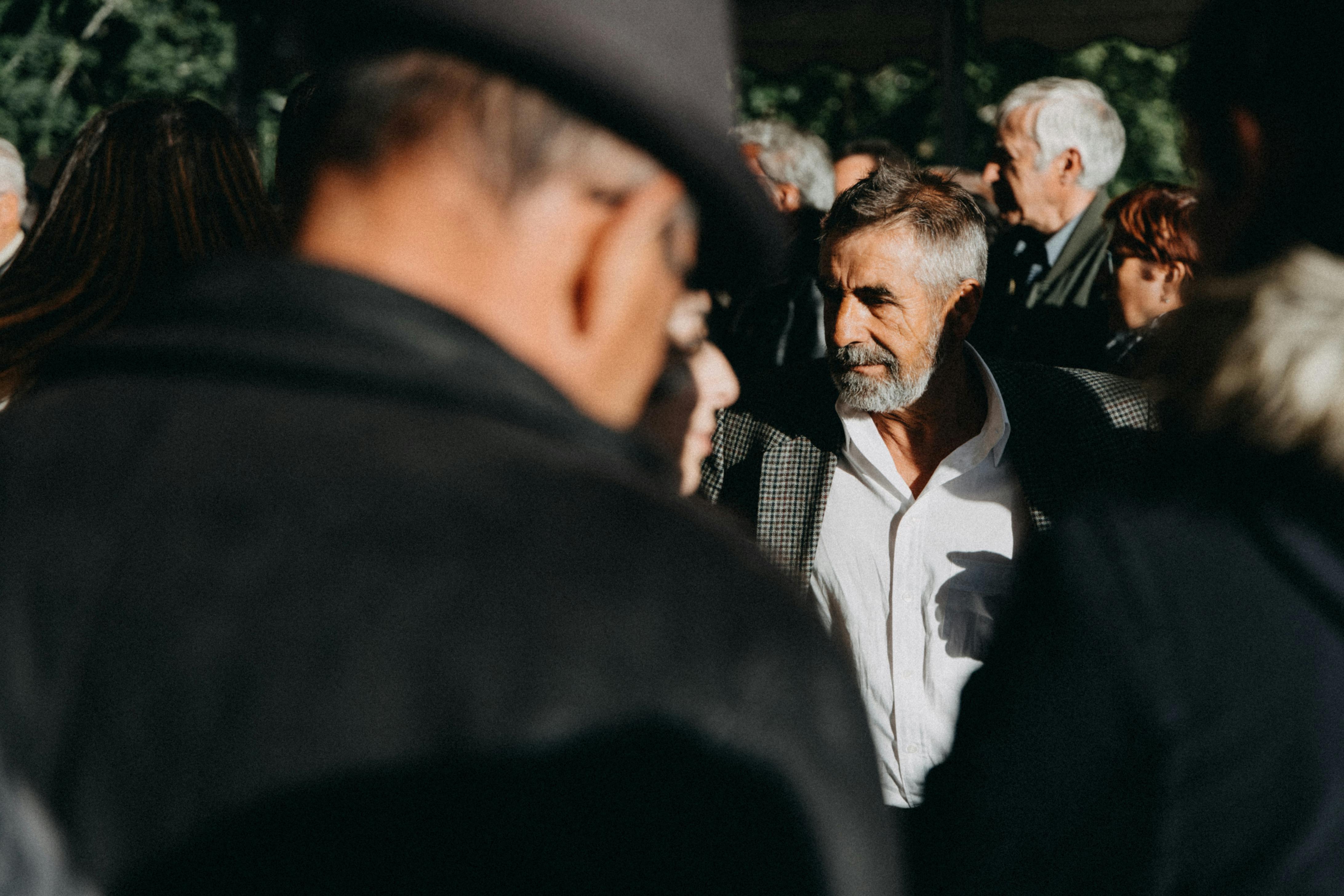 A Man in Black and White Checkered Suit Jacket · Free Stock Photo