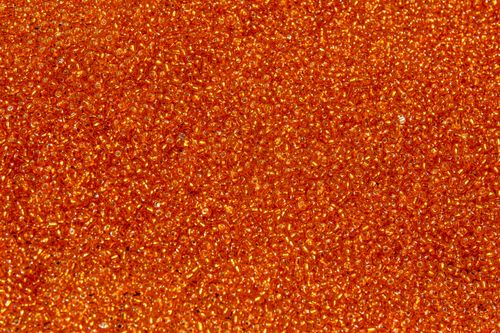 Free Bright and detailed close-up shot of orange beads creating a textured pattern. Stock Photo
