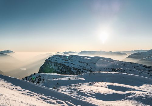 Free Experience the serene beauty of Trentino-Alto Adige's snow-covered mountains at sunrise. Stock Photo