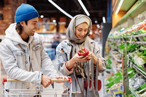 Free Happy Couple Buying Groceries Stock Photo