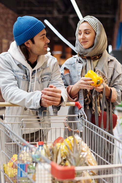Couple Buying Groceries at a Supermarket