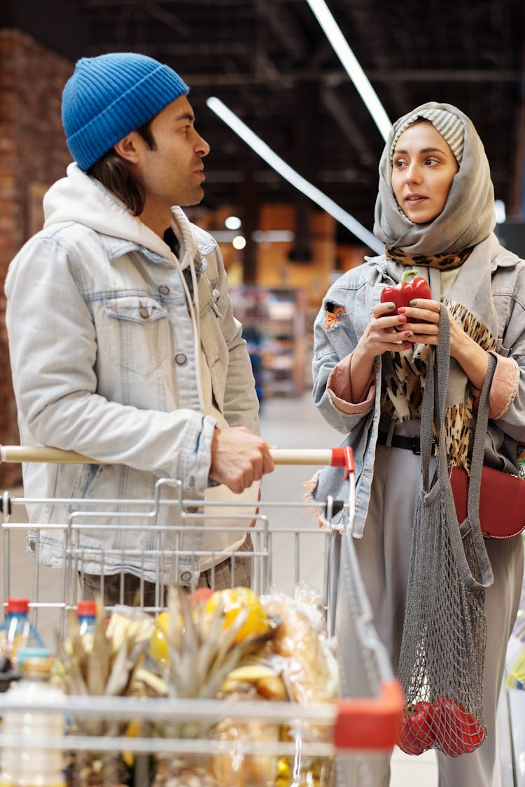 Couple Buying Groceries At A Supermarket