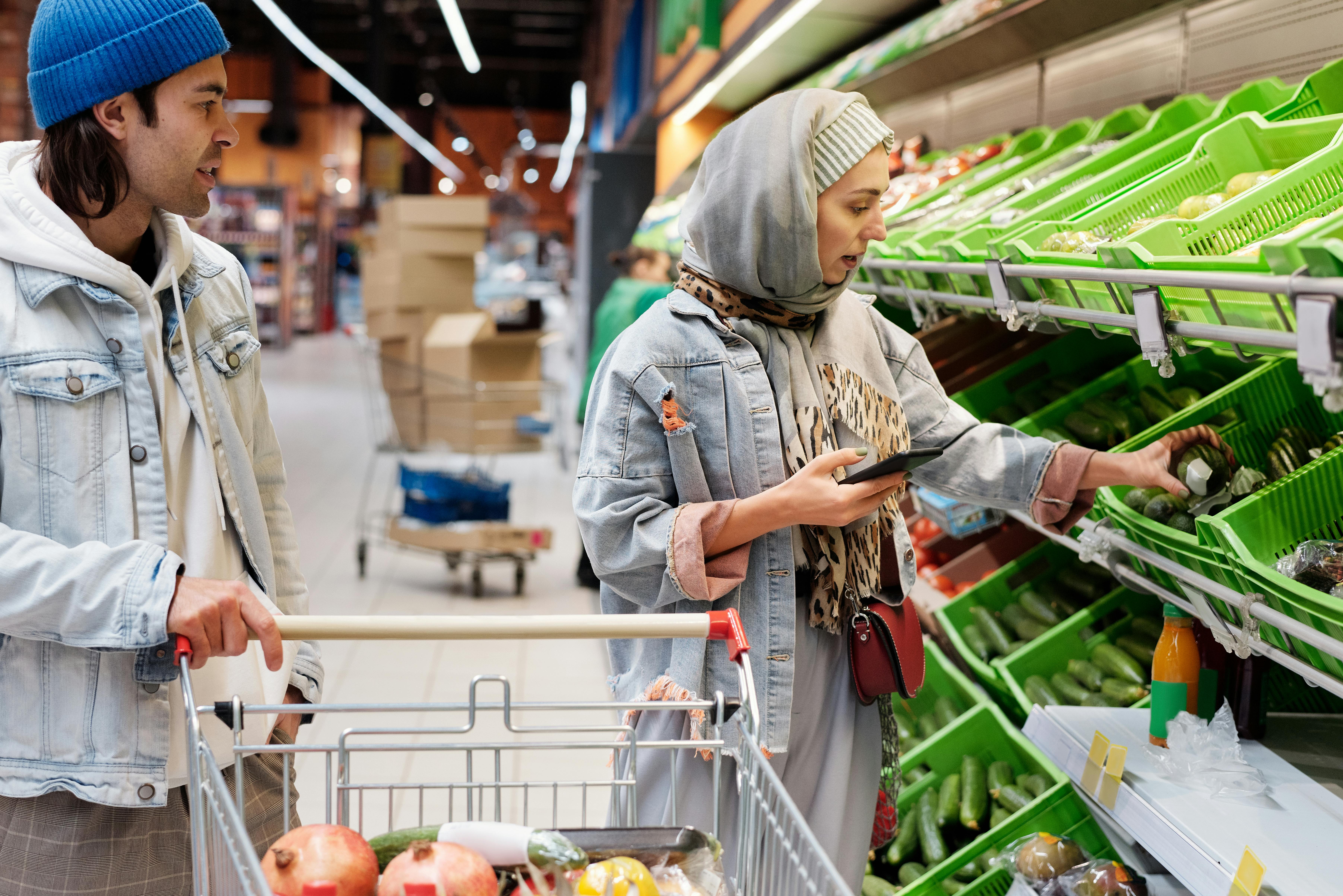 couple buying groceries at a supermarket