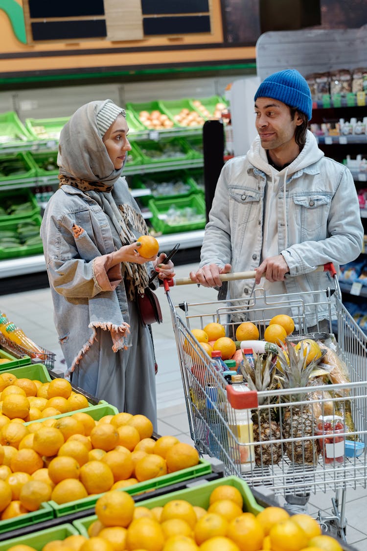 Couple Buying Groceries At A Supermarket