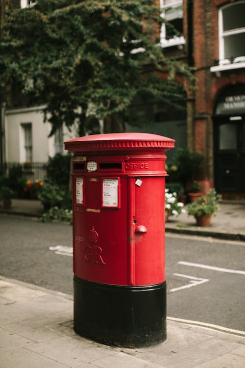 Free Red Mail Box on Roadside  Stock Photo