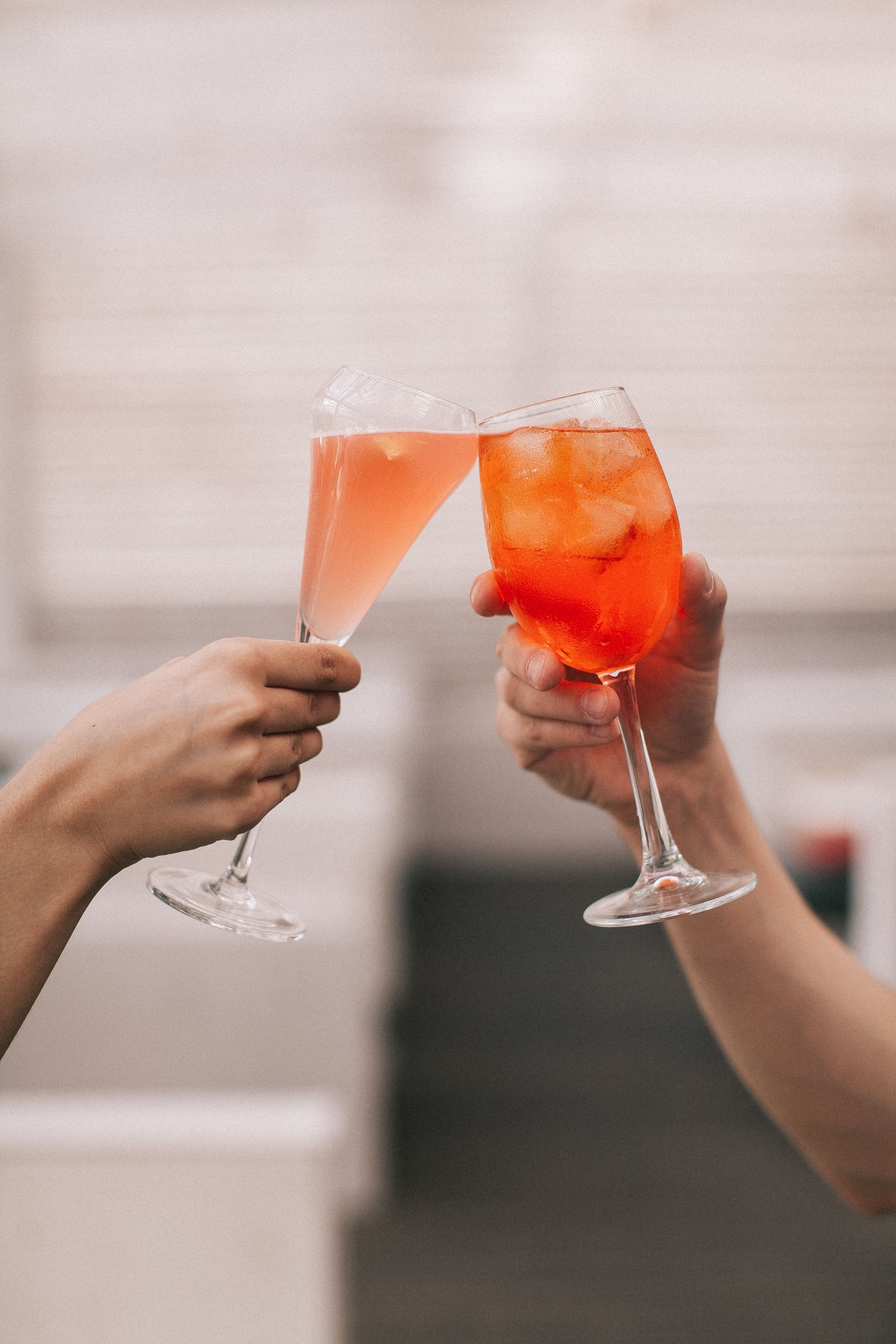Hands Toasting Wine Glasses With Red Wine · Free Stock Photo