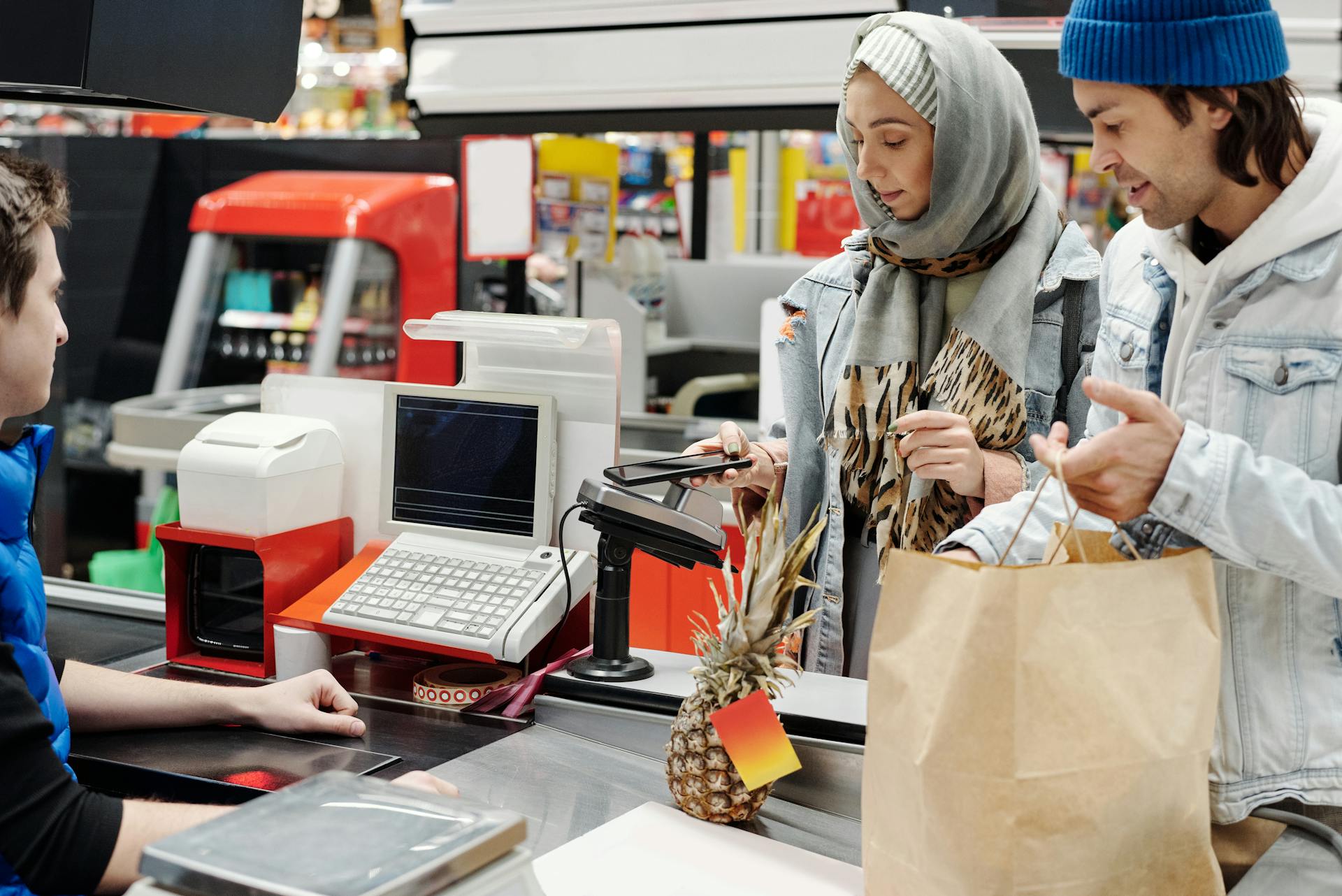 Couple Buying Groceries at a Supermarket