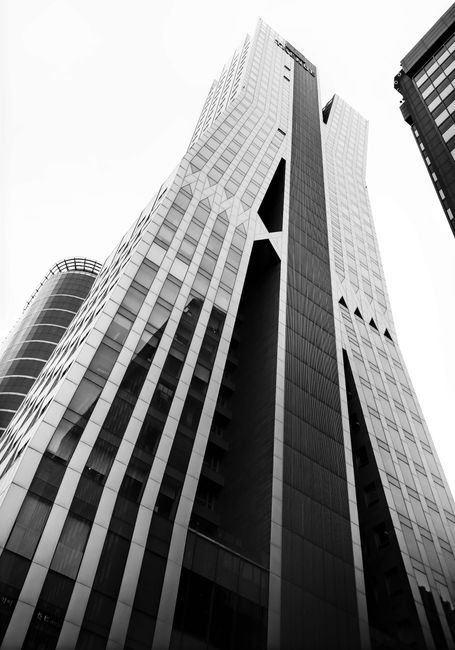 Black and white view of S-Trenue Tower, a modern skyscraper in Seoul.