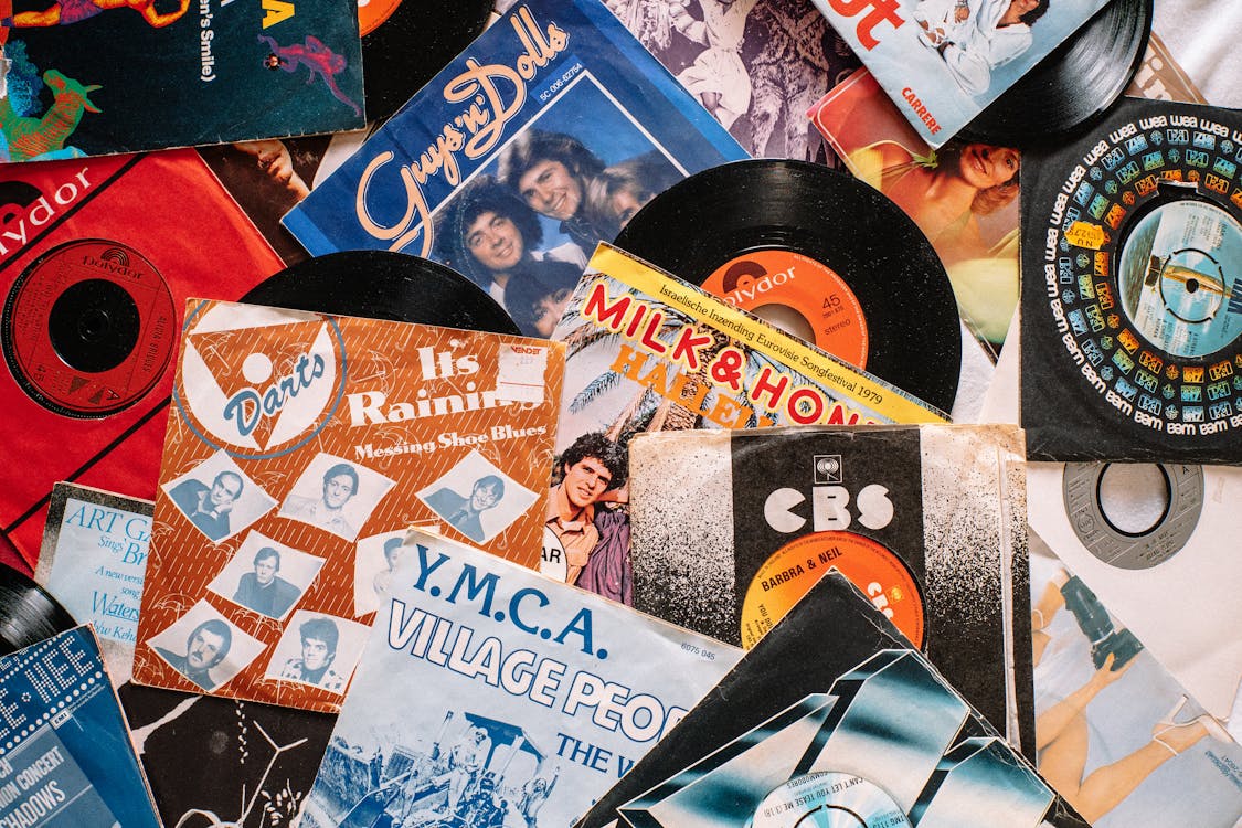 Free Set of retro vinyl records on table Stock Photo