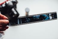 Person Holding Film Strip