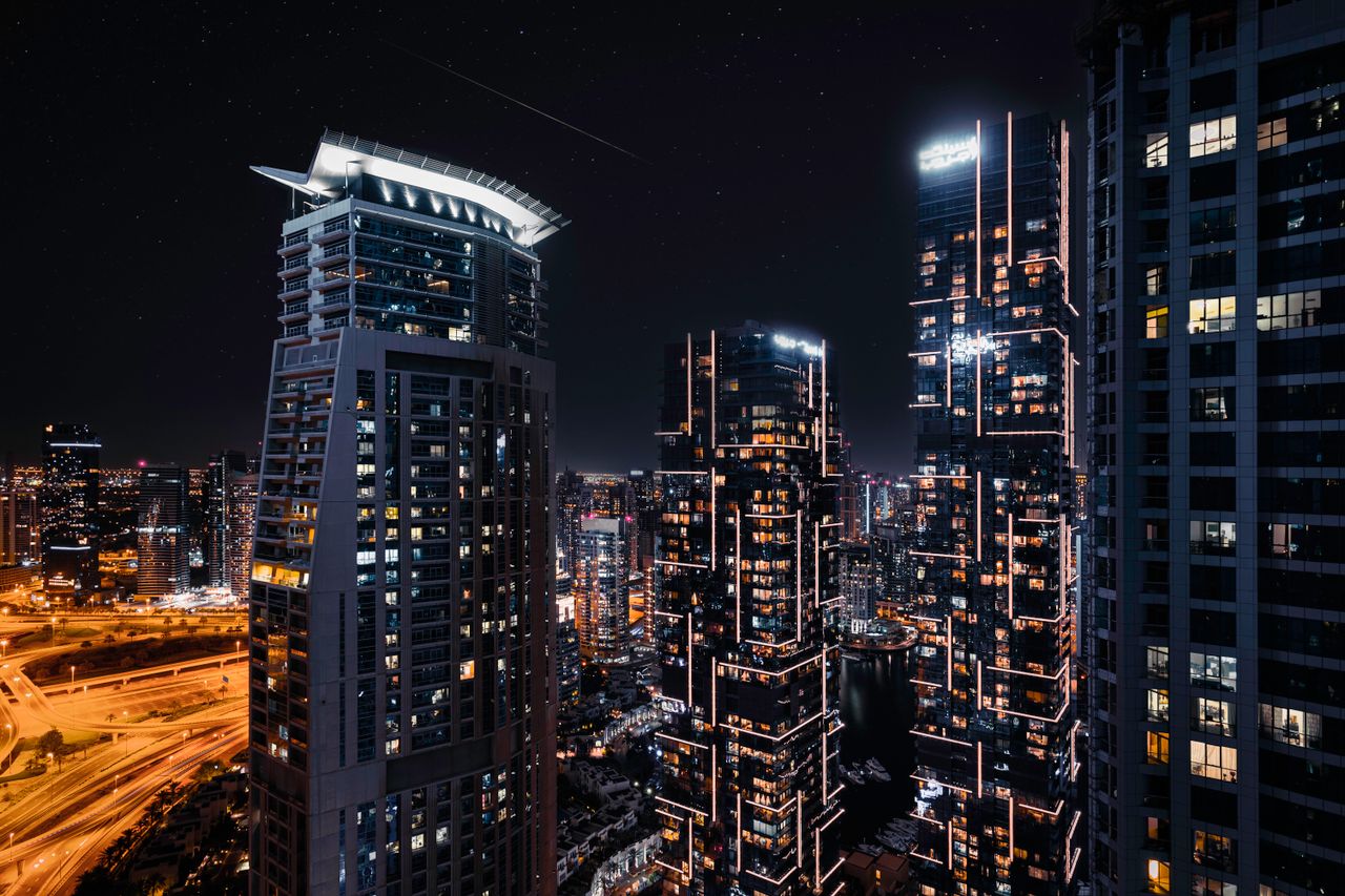 stunning view of dubai s modern skyline at night with illuminated skys