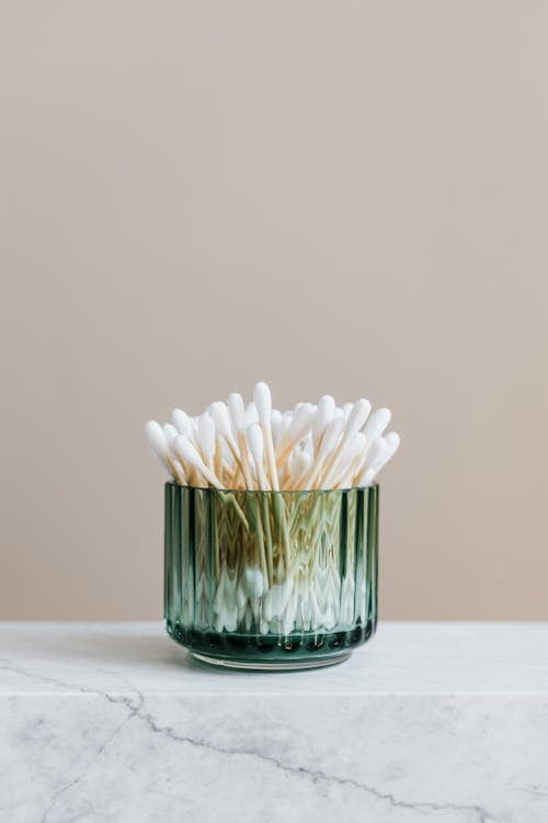 Free Photo of White Cotton Buds on Glass Container Stock Photo