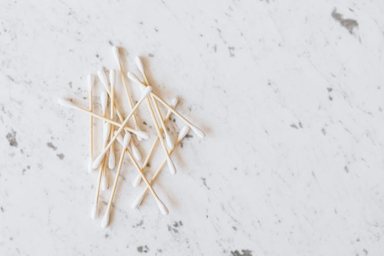 Pile Of Cotton Ear Buds On Marble Table