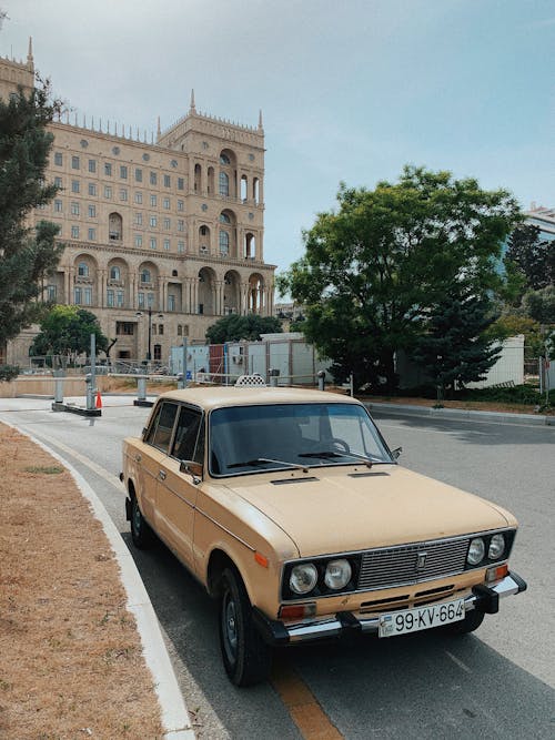 Brown Classic Car Parked on Roadside