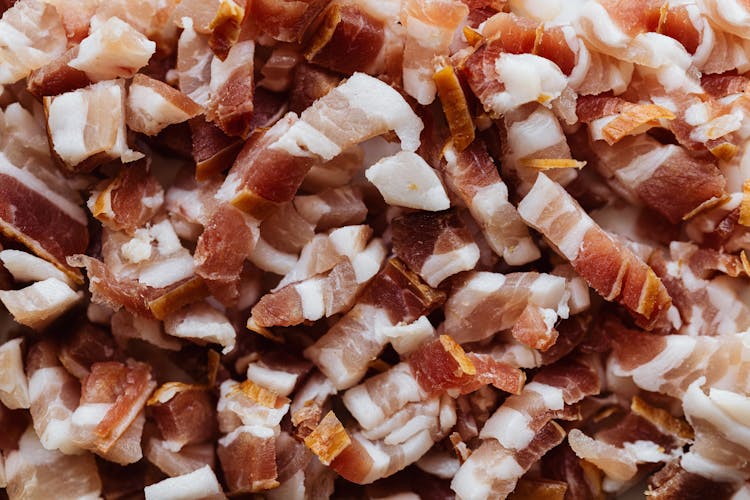 Heap Of Bacon Cut Into Small Slices