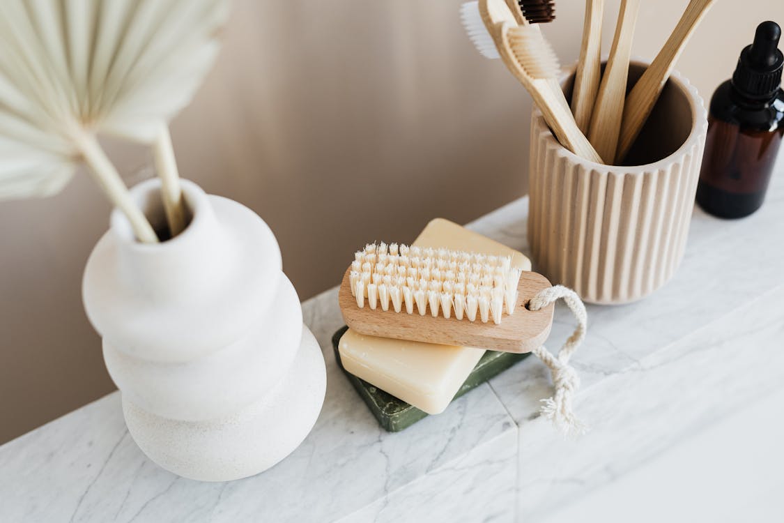 Free Set of natural toiletries on marble tabletop Stock Photo