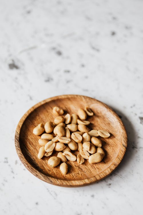 Brown Nuts on Brown Wooden Bowl