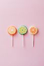 Multicolored candies on plastic sticks