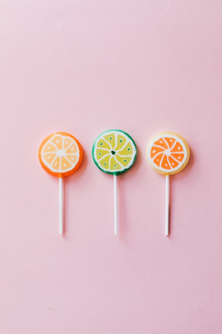 Multicolored Candies On Plastic Sticks