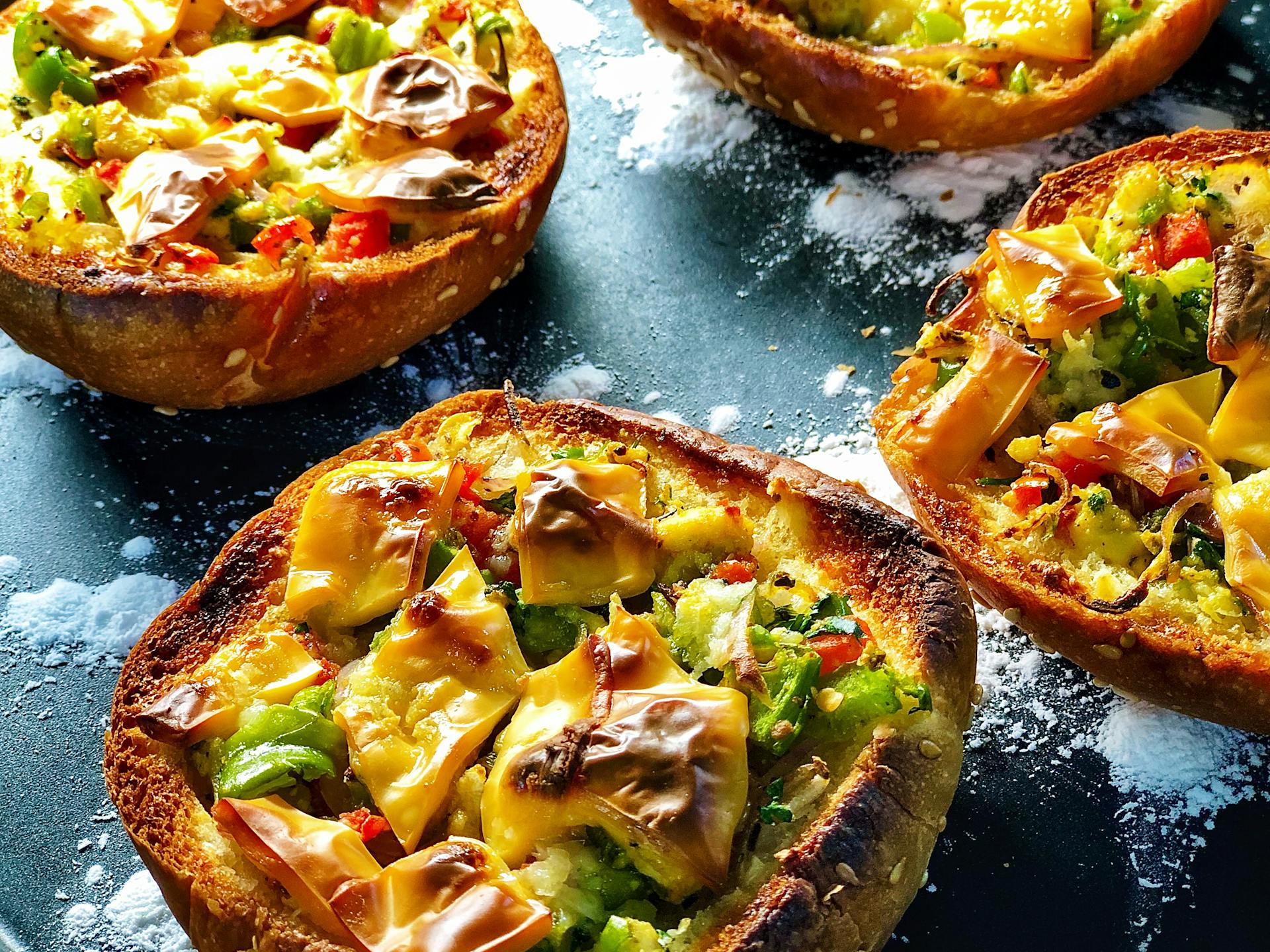 Delicious mini bread pizzas served on board